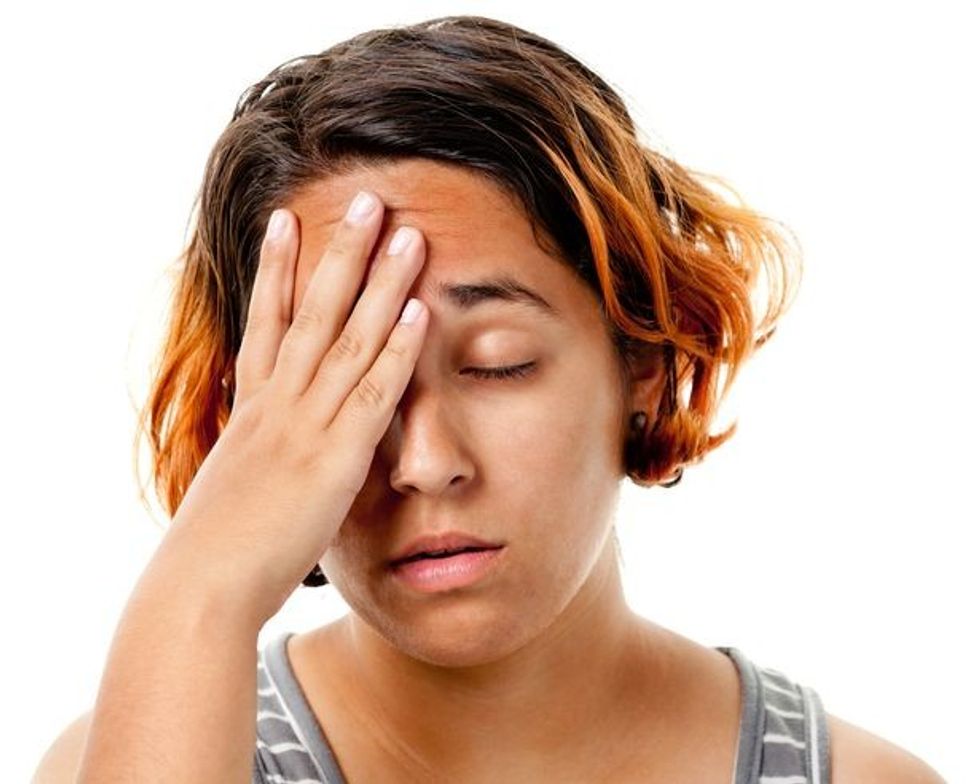 0 Disappointed Young Woman Closes Eyes And Puts Hand Over Face