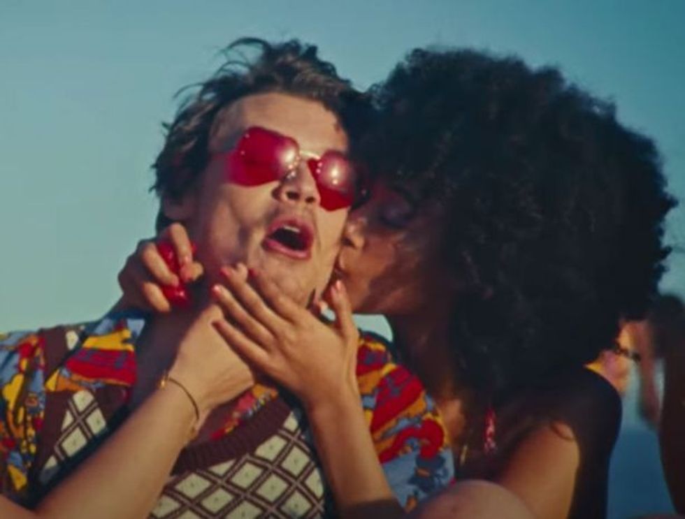 0 Harry Styles dedicates new music video to touching as hes tempted by models in serious summer 1