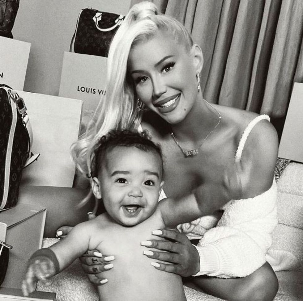 0 iggy shares rare pics of son and slams playboi carti 1