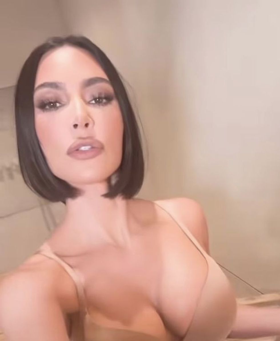 0 Kim Kardashian goes topless in new ad for her brand Skims 1