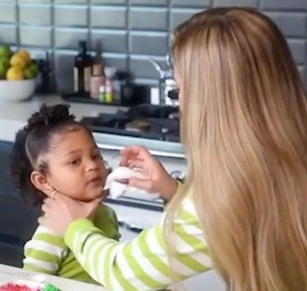 0 Kylie Jenner disturbs fans by allmost poking daughter Stormi in the eye with her ridiculous nails