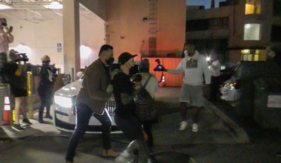 0 Kylie Jenners Rolls Royce is seen surrounded by media and protestors in Los Angeles