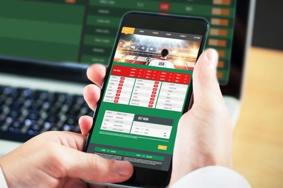 0 PAY PROD Composite image of businessman using smartphone Image shot 072015 Exact date unknown