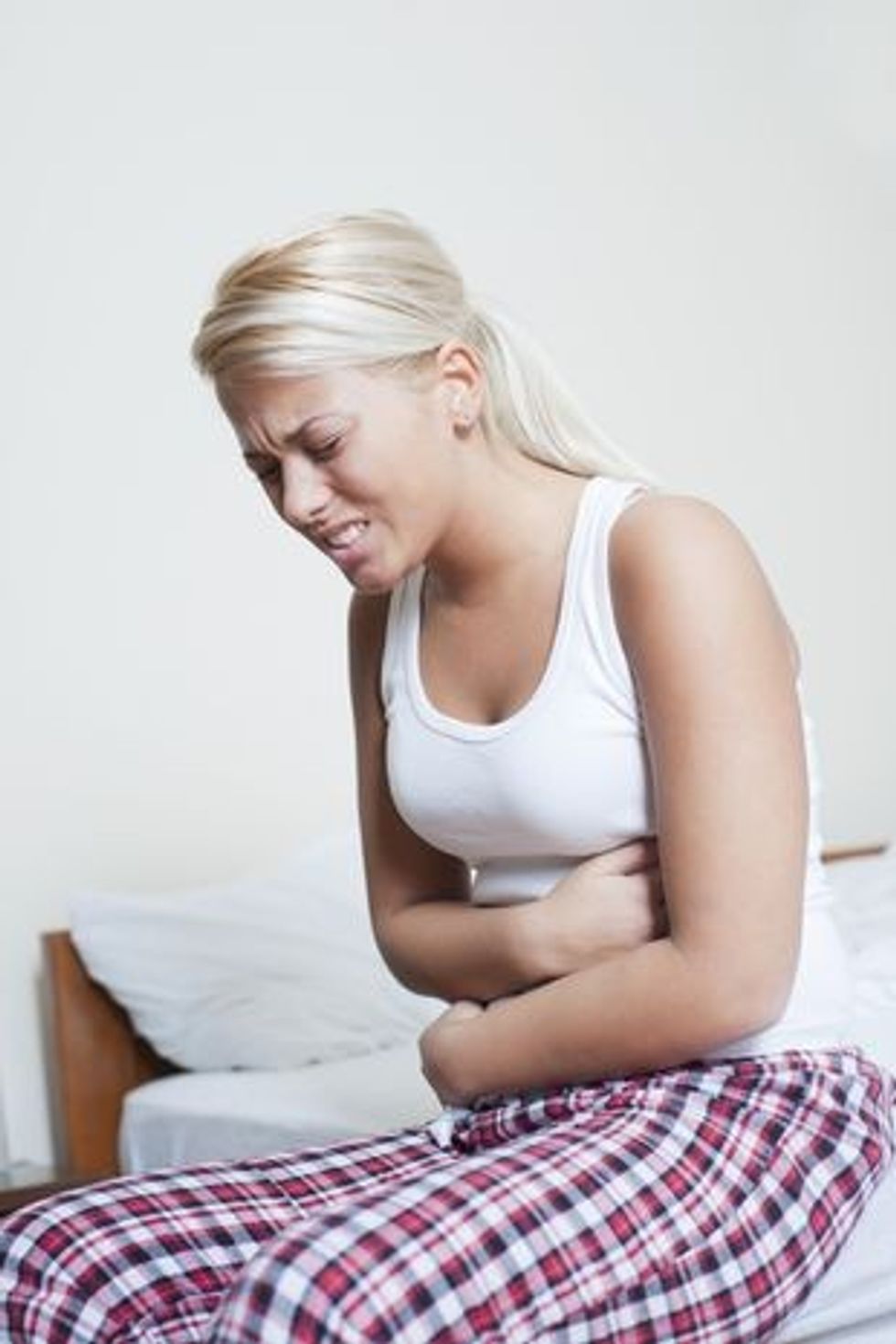 0 Stomach problem young woman in pain