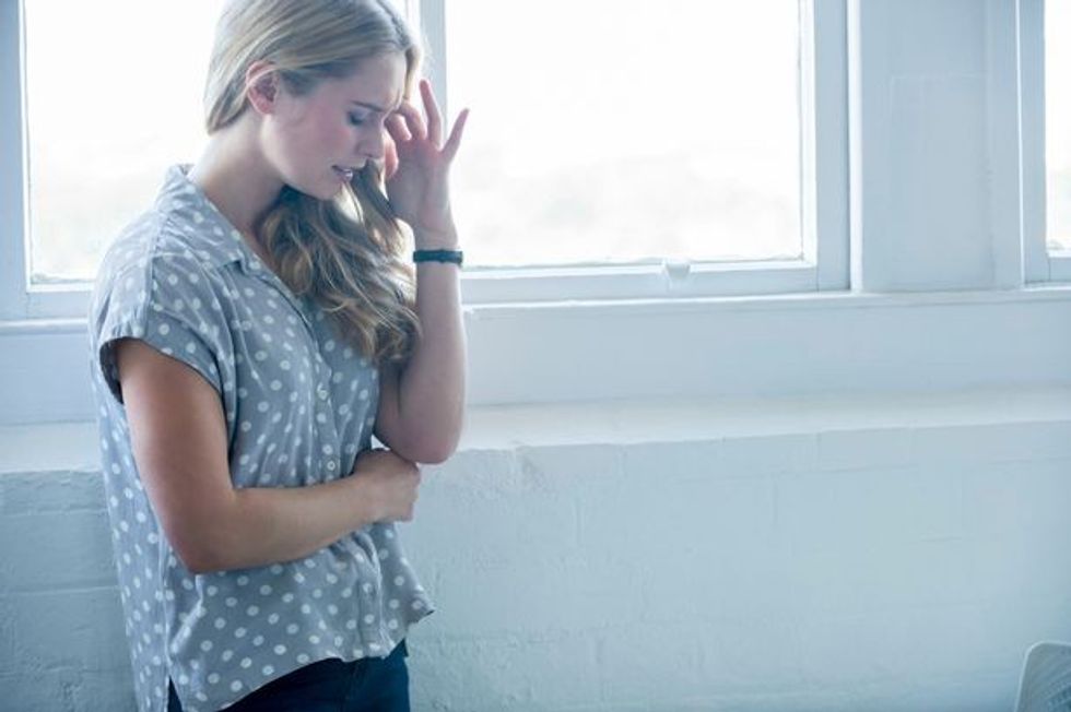 0 Woman looking upset or in pain