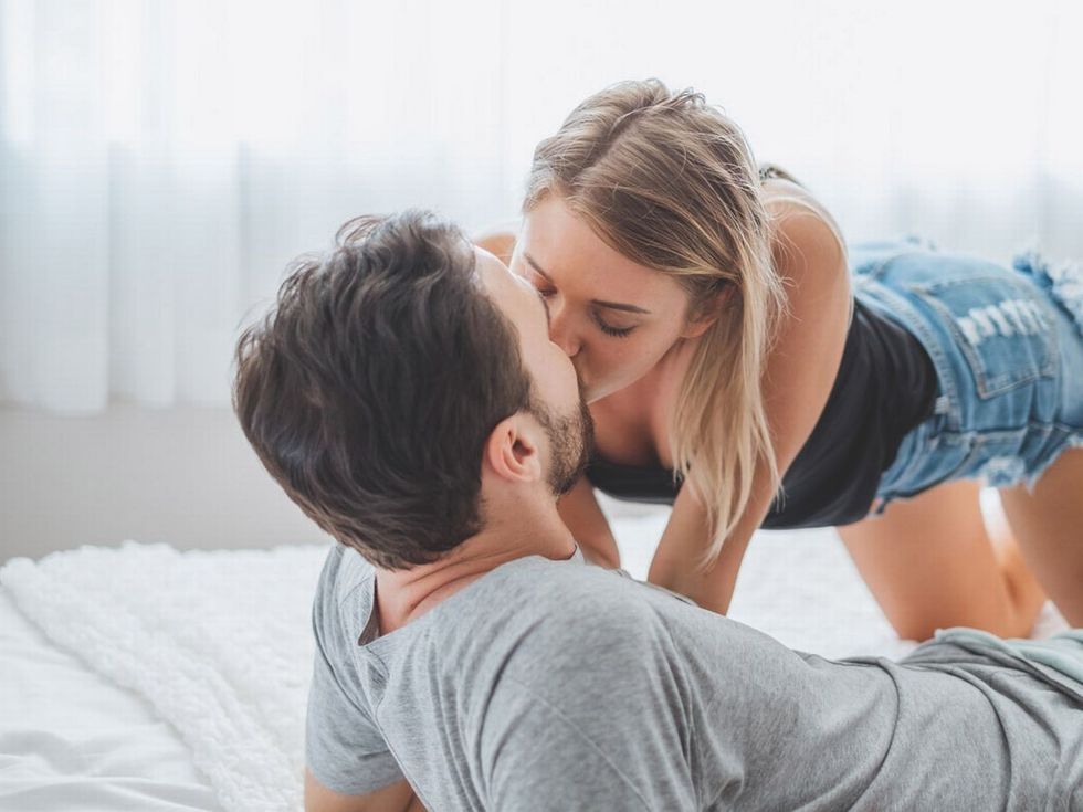 0 Young Couple Kissing On Bed