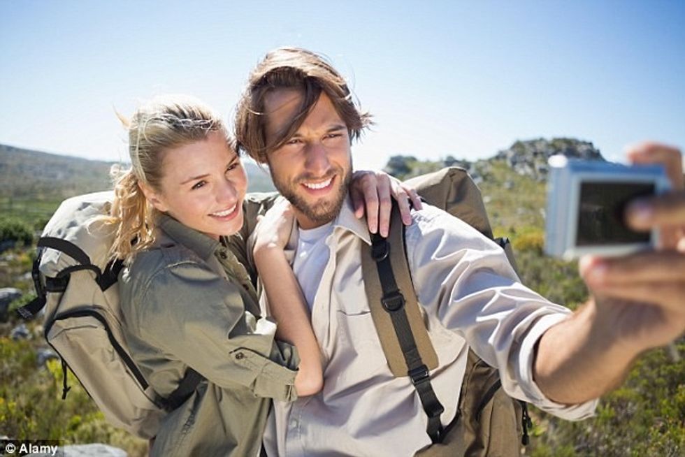 1410192019538 wps 34 E4D4D1 Hiking couple stan