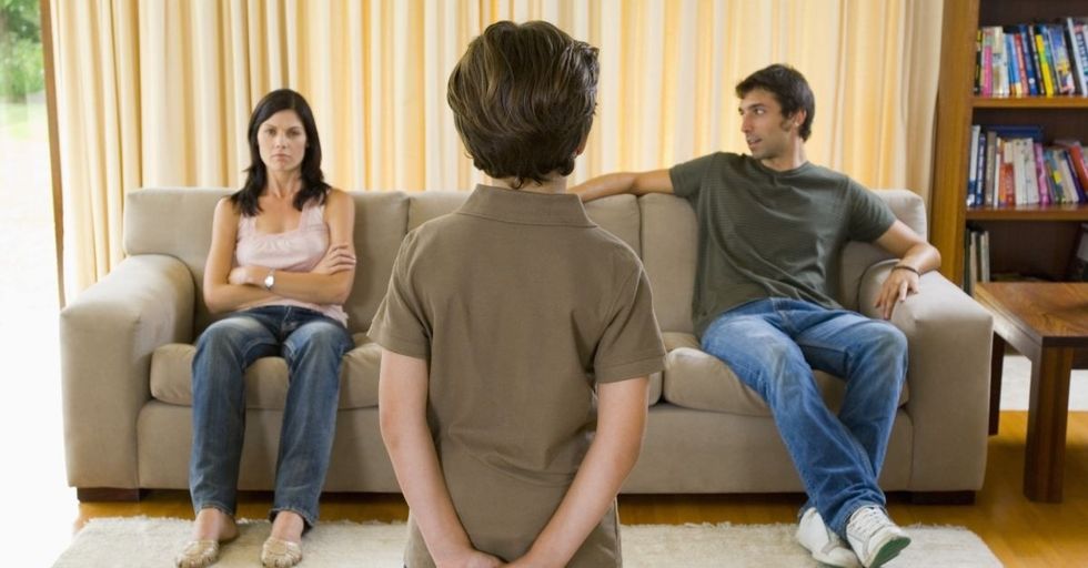 14730 child boy trouble discipline mom dad parents stern wide.1200w.tn