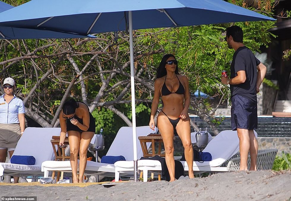 15042338 7163715 Beauty Kim s ample assets were barely contained in the black tri a 2 1561049595053