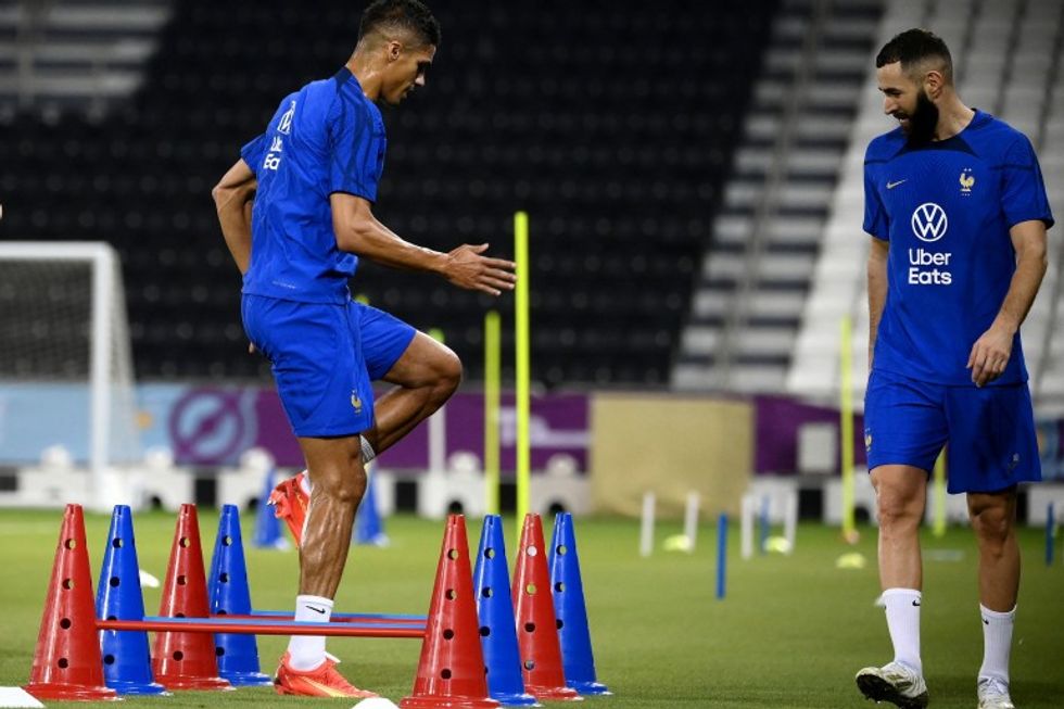 1552727 raphael varane et karim benzema a doha le 17 novembre 2022