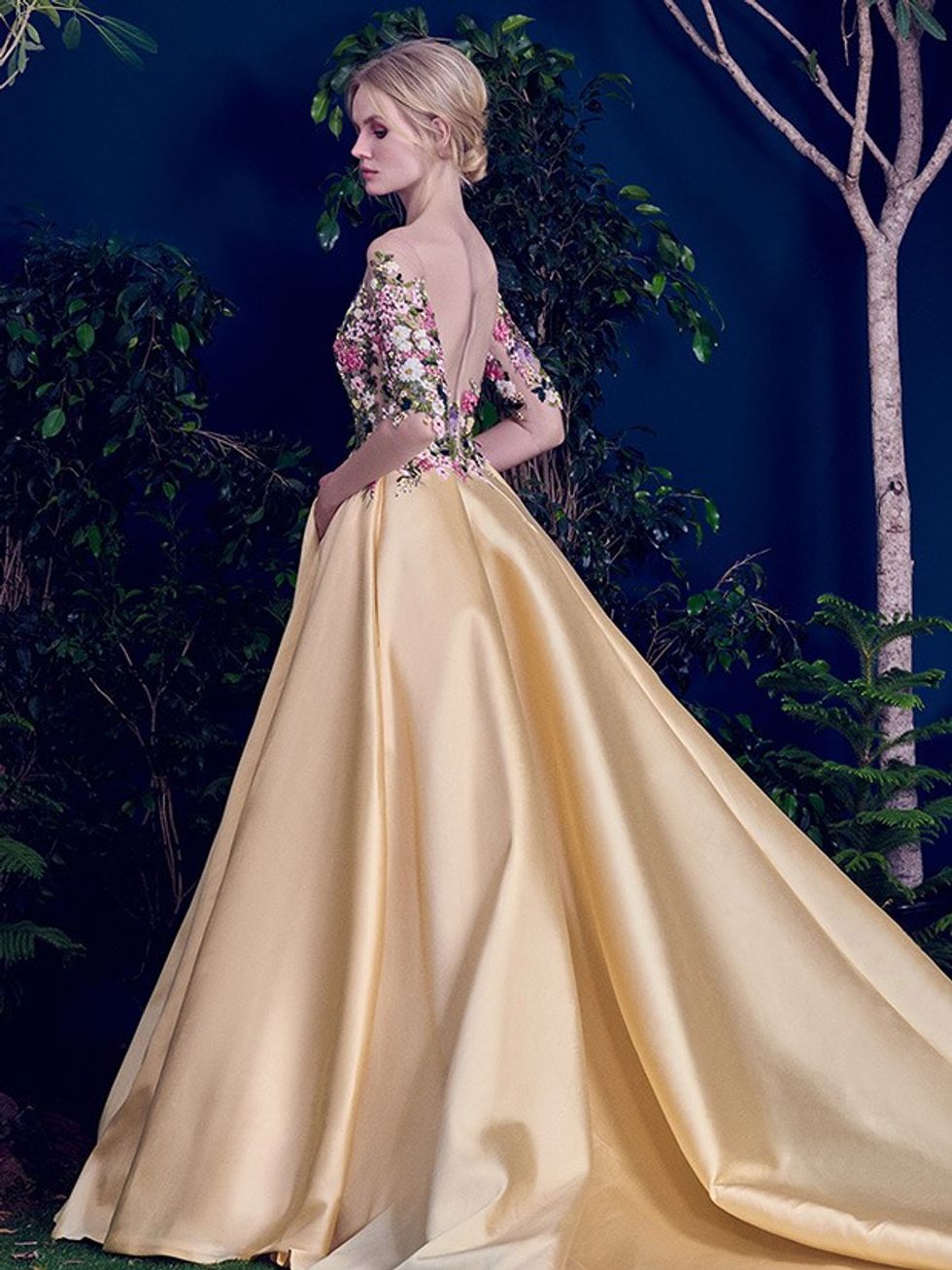 16 Pastel yellow skirt and a floral backless top with short sleeves