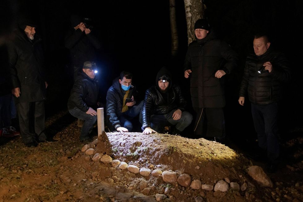 1637076333 2021 11 16T131634Z 1535665107 RC2PVQ98JWWM RTRMADP 3 EUROPE MIGRANTS BELARUS POLAND FUNERAL 1