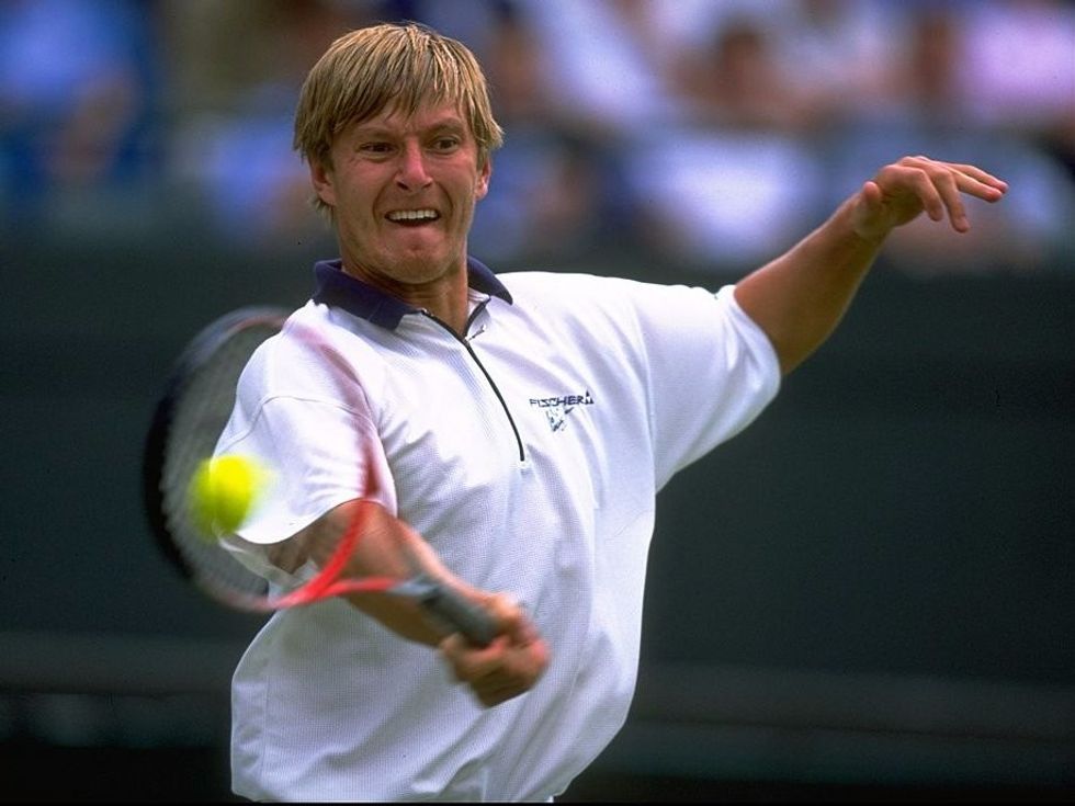 17 yevgeny kafelnikov 23883797