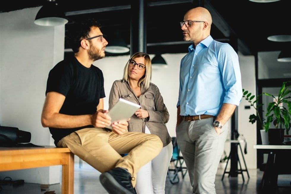 171018 better stock colleagues conversation work office ew 1149a 4d08ae2aca3387646325915b2c967c8d.fit 760w