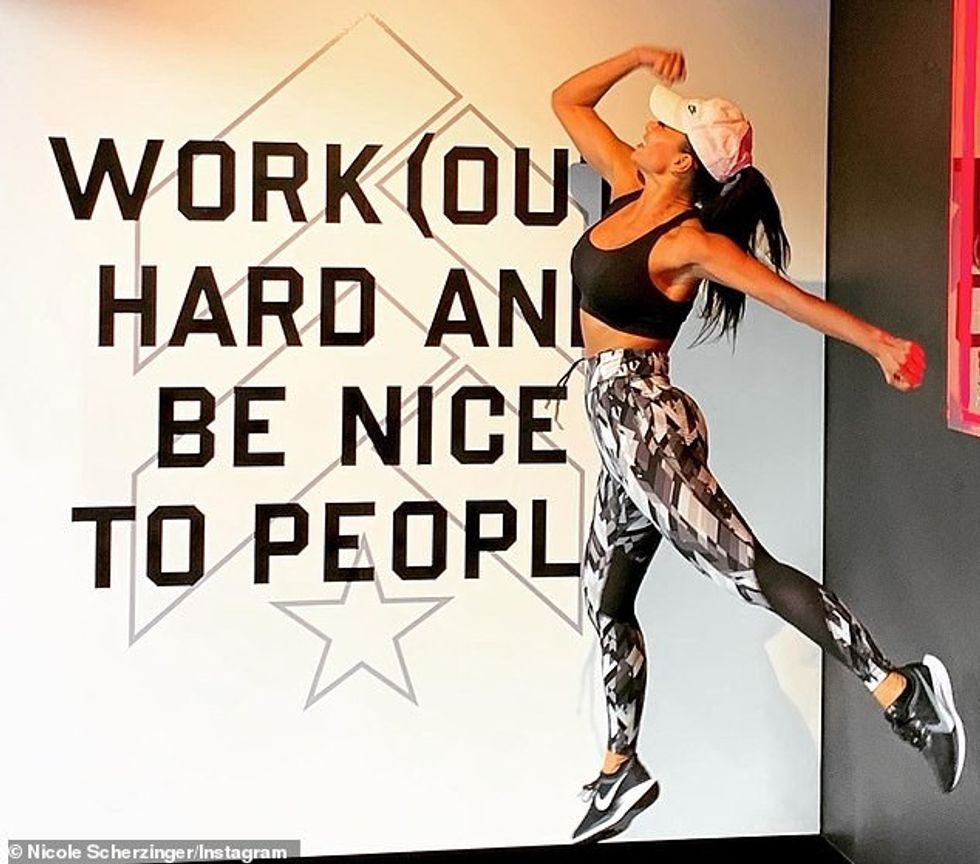 17665202 7392291 Breaking a sweat Nicole balances group sessions at F45 and Barry m 77 1566724402571