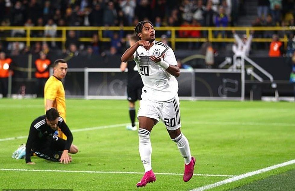 19508474 7555557 Serge Gnabry celebrates scoring Germany s first goal of the nigh a 2 1570654208384 e1570656800965