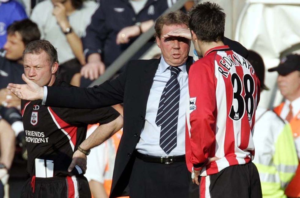 2/4/2005 FA Premiership Football. Southampton v Chelsea. Southmapton manager Harry Redknapp talks with his son Jamie. Photo: Steve Bardens / Offside