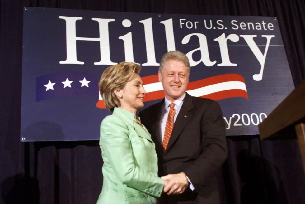 2000 President Clinton and first lady Hillary Rodham Clinton embrace during the New York State Senate 2000 luncheon Saturday, July 29, 2000 in New York City. President and Hillary will be spending the night in their residence in Chappaqua, NY. (AP Photo/Pablo Martinez Monsivais)