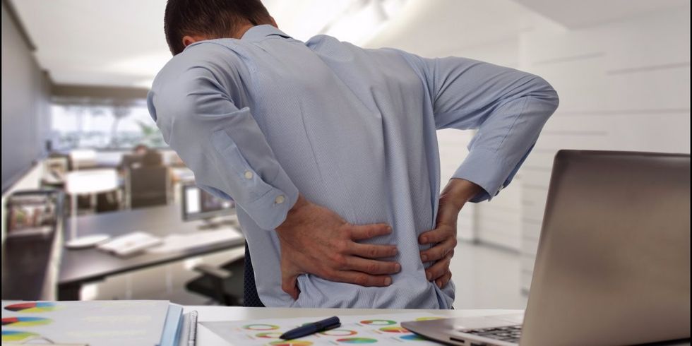 2011/05/how-to-relieve-back-pain-if-youre-sitting-all-day-at-work.jpg