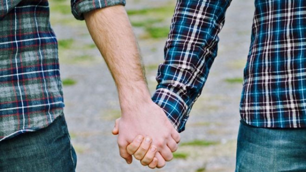 2016/09/original_4620877824-Gay-couple-holding-hands-Parliament-to-approve-gay-marriage.jpg