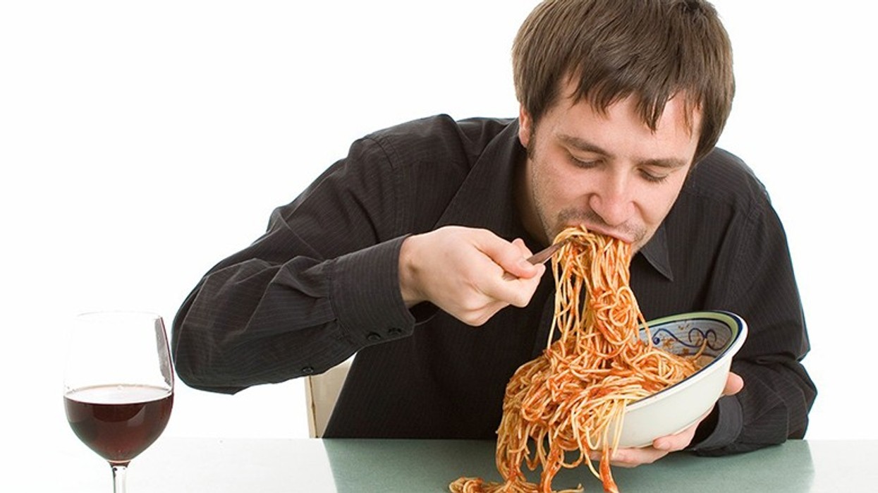 2017/02/man-eating-spaghetti-foods-make-you-hungrier.jpg