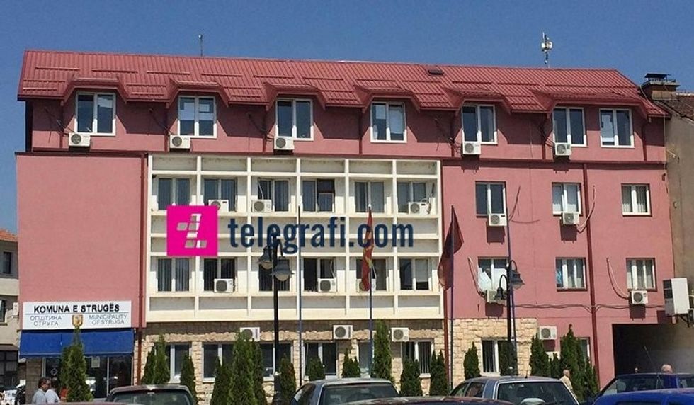 2017/08/Komuna-e-Strug\u00ebs-me-llogo.jpg