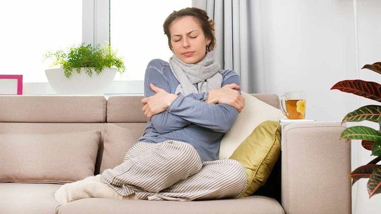 2018/03/woman-freezing-on-sofa.jpg