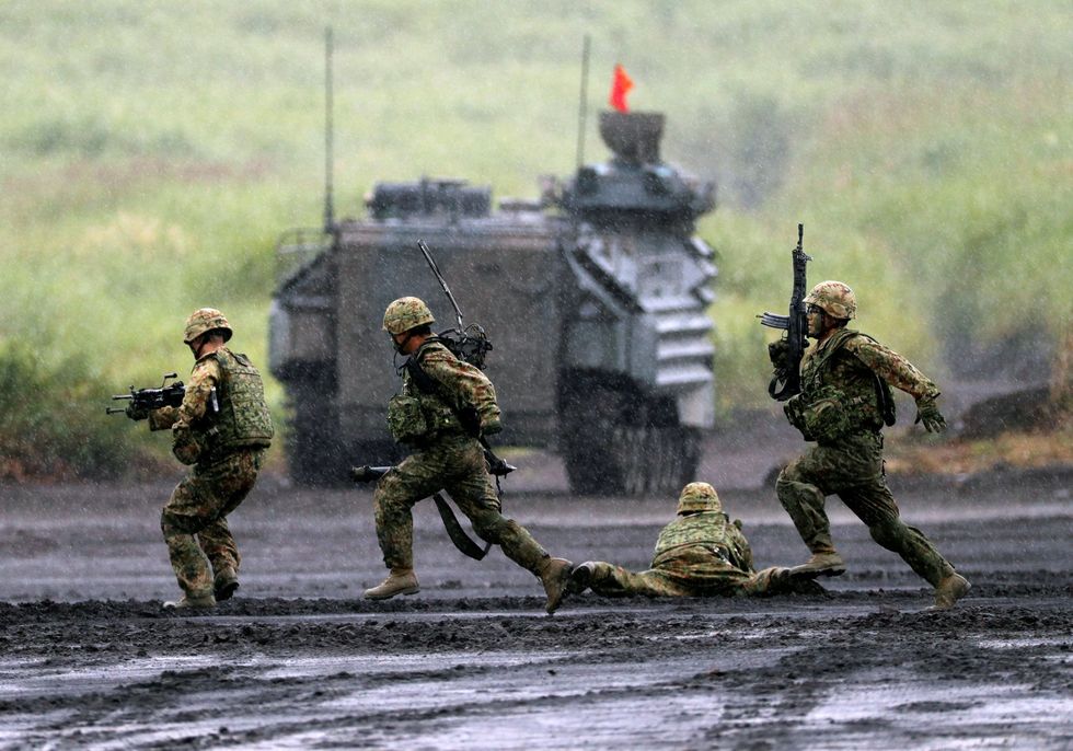 2018 08 23T042225Z 871981222 RC144E233730 RTRMADP 3 JAPAN MILITARY DRILLS