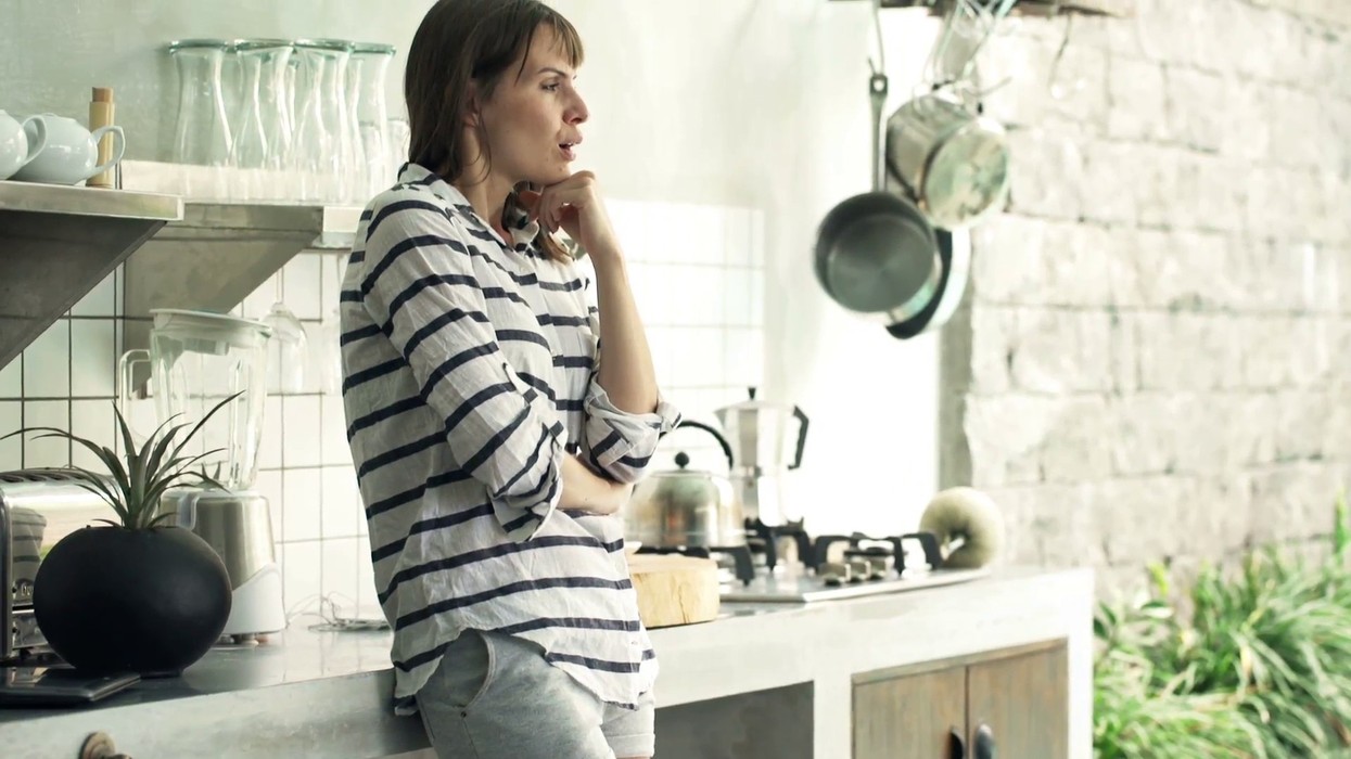 2018/08/sad-unhappy-woman-standing-in-kitchen-at-home_syfkohih7__F0000.jpg