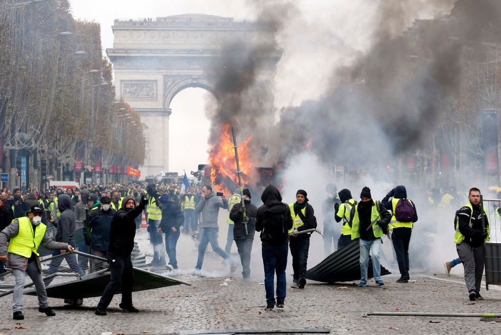 2018/12/france-tear-gas-rising-fuel-tax.jpg