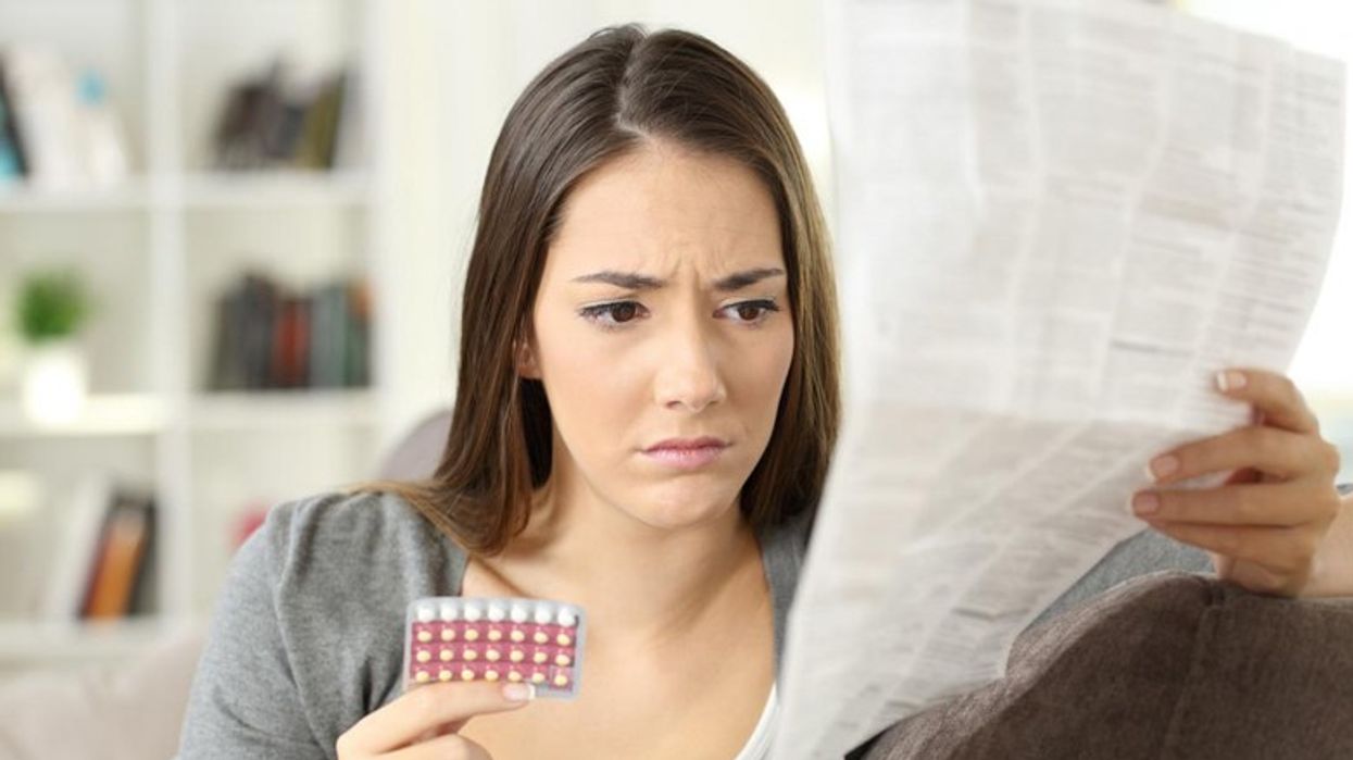 2019/03/woman-reading-leaflet-after-losing-a-birth-control-pill.jpg