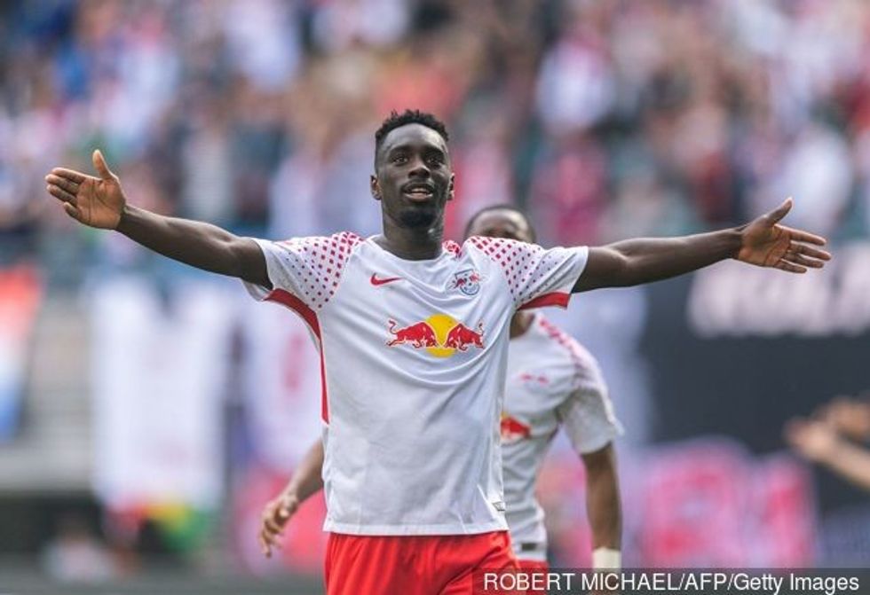 2019/08/leipzigs_french_forward_jeankevin_augustin_celebrates_after_scor_823963-e1565271466106.jpg