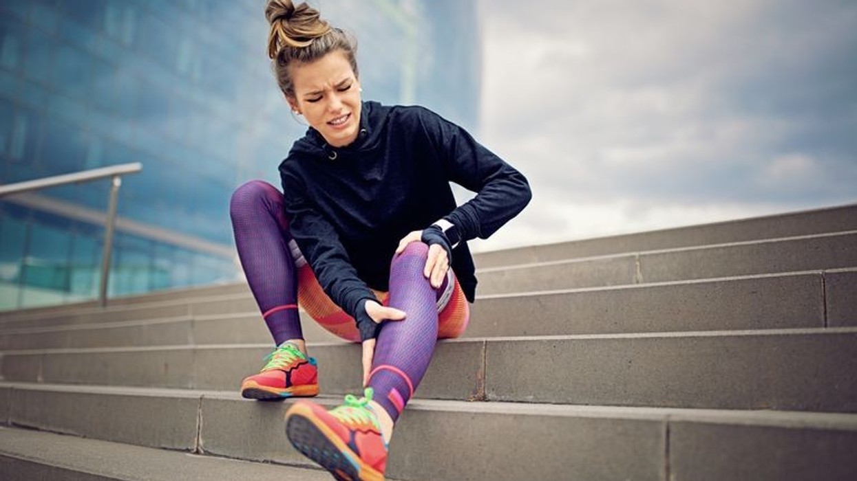 2019/10/injured-runner-girl-is-sitting-on-the-city-stairs-899449982-5b0dc21a8023b90036f13f27.jpg