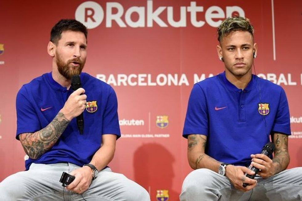 2019/11/0_FC-Barcelona-football-star-Lionel-Messi-and-Neymar-during-a-press-conference-in-Tokyo.jpg