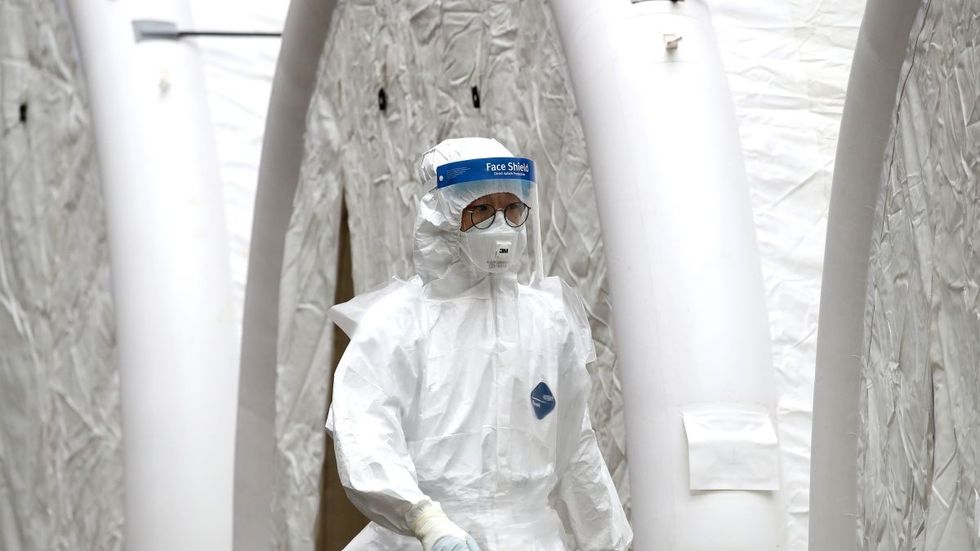 2020/03/https___cdn.cnn_.com_cnnnext_dam_assets_200222123543-coronavirus-seoul-medic.jpg