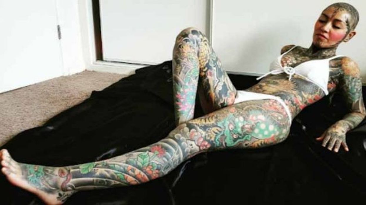 2020/12/woman-gets-tattooed-from-head-to-toe-including-genitals-spends-almost-270002-650x364-1.jpg