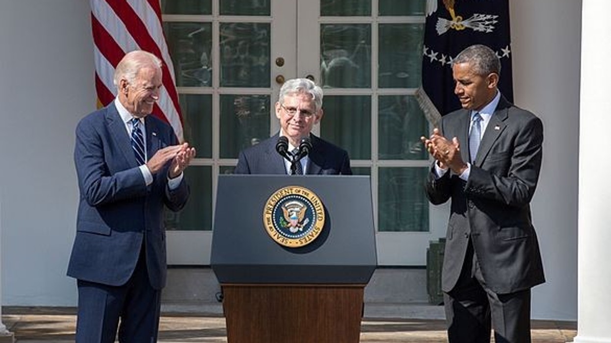 2021/01/585px-2016_March_16_Merrick_Garland_at_podium_with_Obama_and_Biden.jpeg