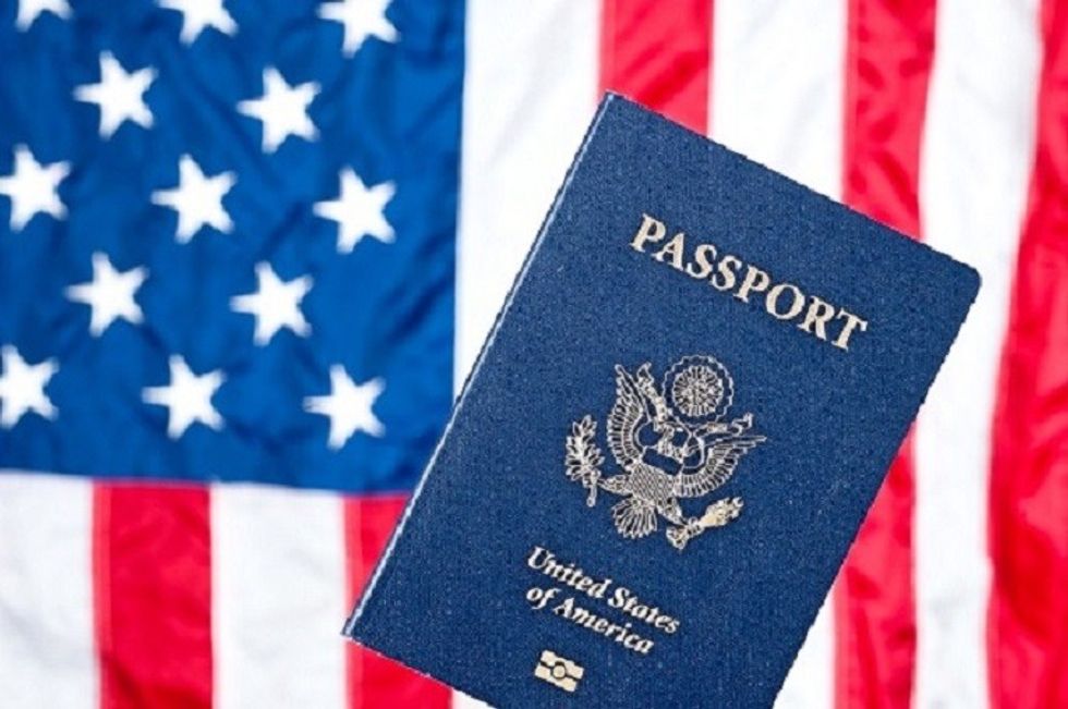 2021/04/american-flag-and-passport-FEATUHB-1.jpg