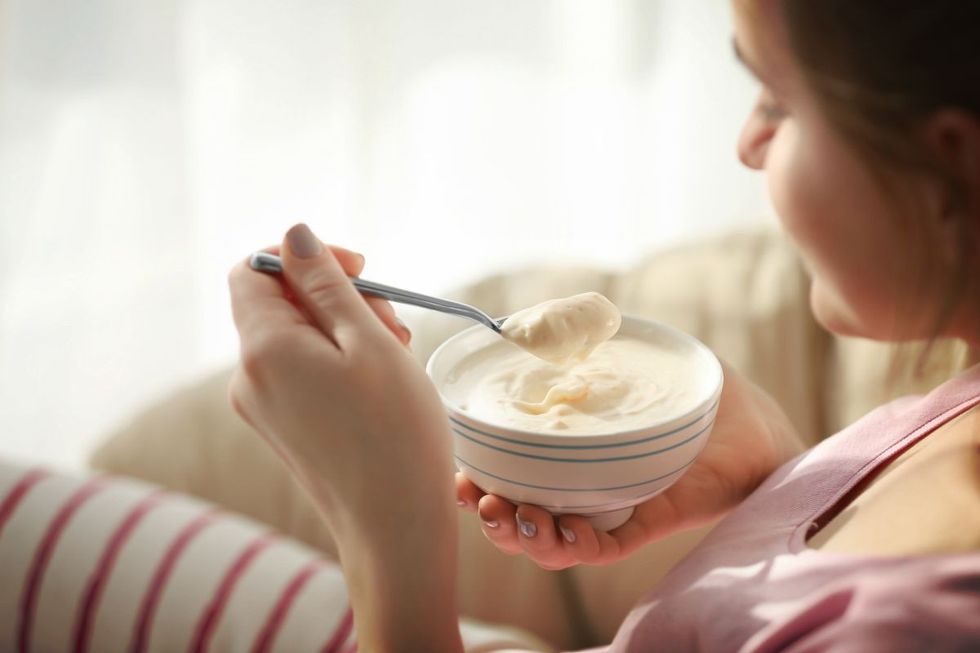 2021/04/bowl-yogurt-spoon-female-hand-what-to-eat-ss.jpg