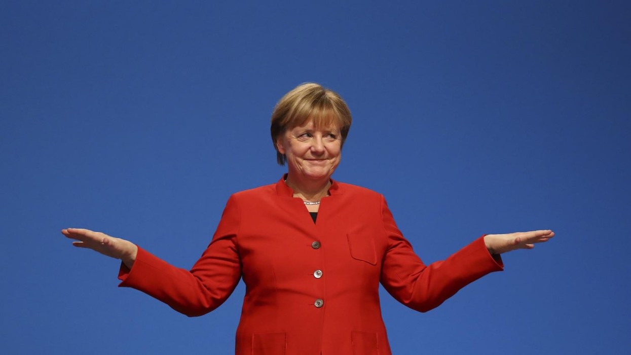 2021/07/merkelhappy.jpg