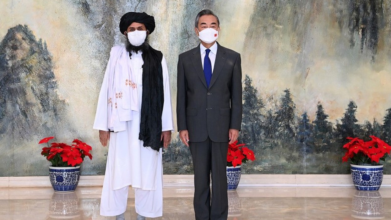 2021/08/China-Taliban-Afghanistan-Wang-Yi-GettyImages-1234277842-e1629472305371.jpg