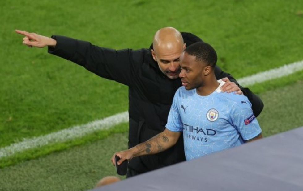 2021/11/guardiola-sterling.jpg