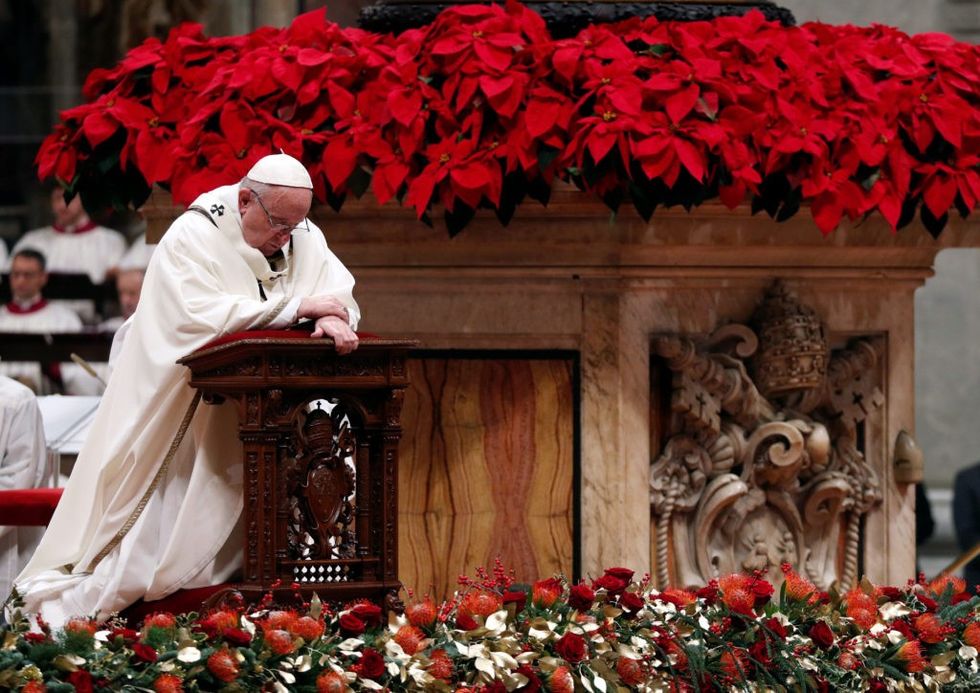 2021/12/2018-12-24T212615Z_925316651_RC1AA530ED00_RTRMADP_3_CHRISTMAS-SEASON-POPE-EVE-1024x724-2.jpg