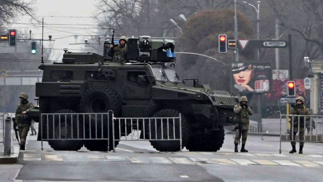 2022/01/122614076_kazakh_service_members_almaty_reuters.jpg