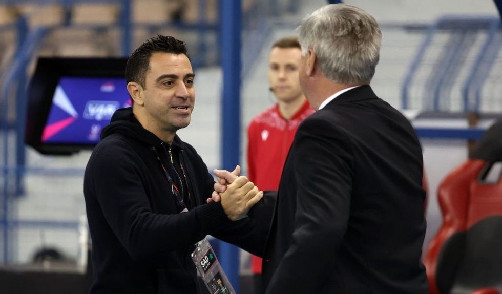 2022/01/Xavi-Ancelotti.jpg