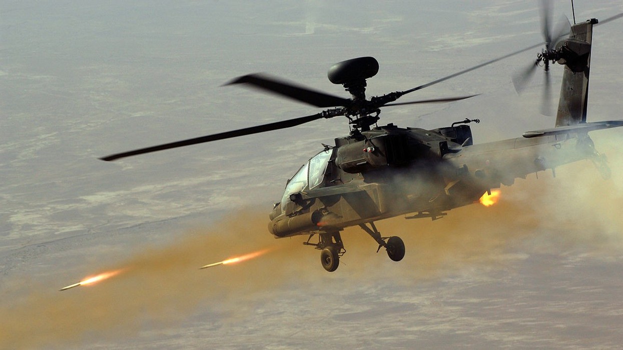 2022/04/1200px-Apache_Helicopter_Firing_Rockets_MOD_45154922.jpg