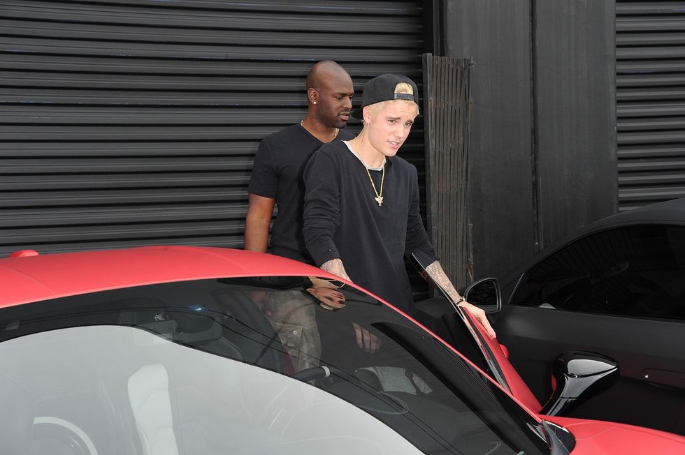 2022/05/Justin-Bieber-Entering-his-Ferrari-458-at-West-Coast-Customs.jpg