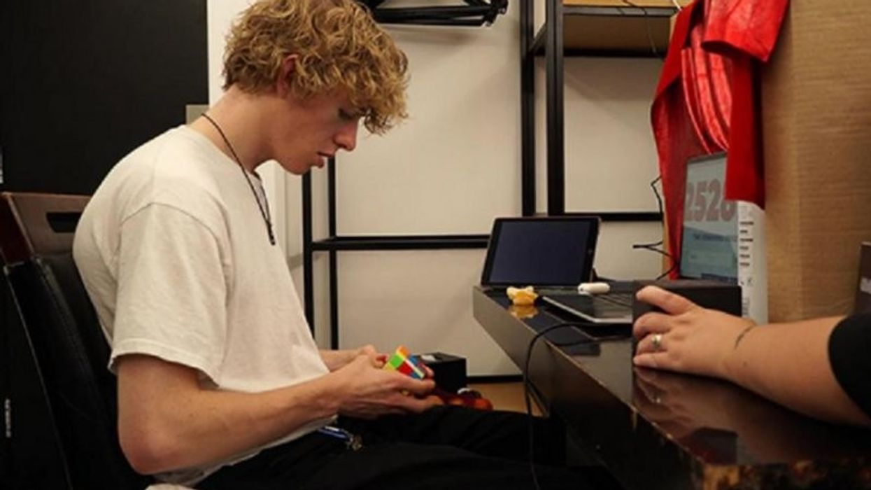 2022/11/British-20-year-old-solves-6931-Rubiks-cubes-in-24-hours.jpg