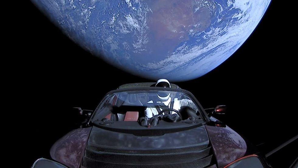 2023/02/230203122332-spacex-elon-musk-tesla-roadster-five-years.jpg