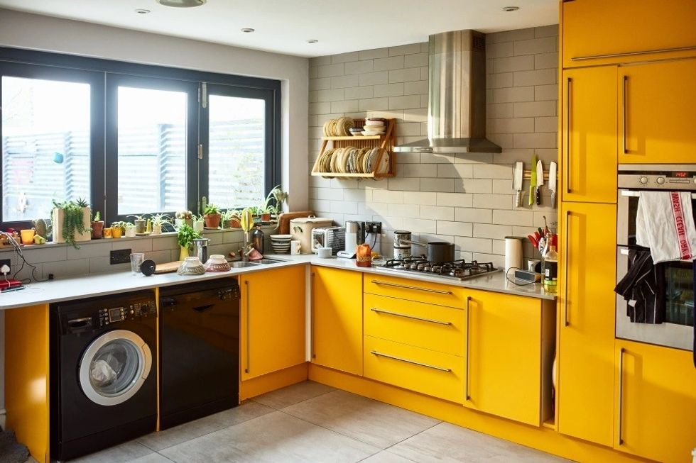 2023/03/designed-domestic-kitchen-yellow-doors-795892413.jpg
